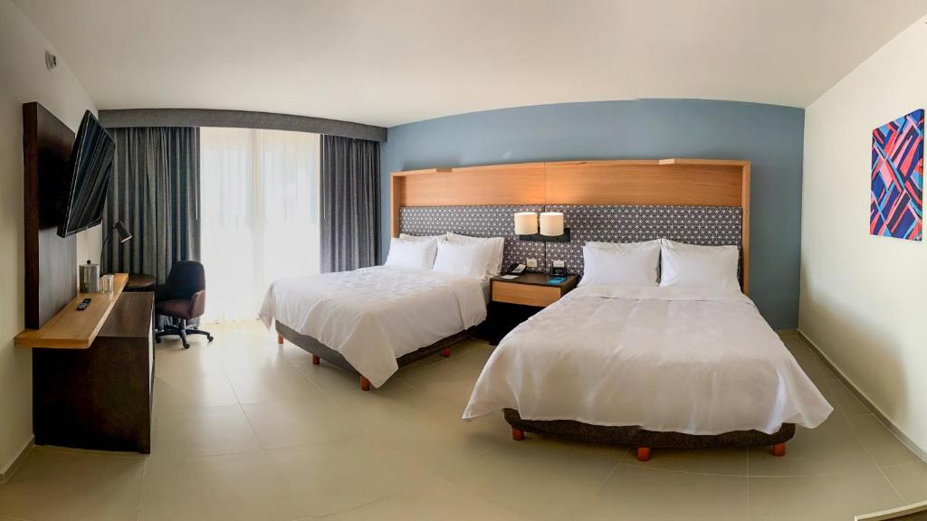 Postel nebo postele na pokoji v ubytování Holiday Inn Tuxpan - Convention Center by IHG