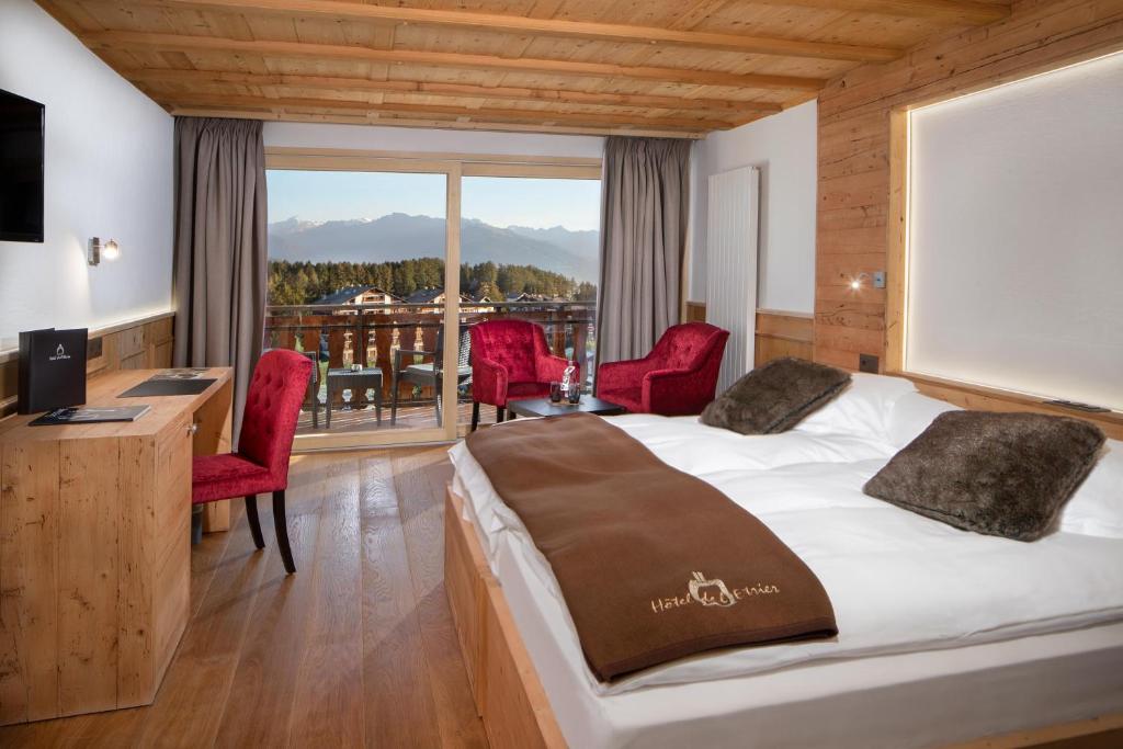 Postel nebo postele na pokoji v ubytování Hotel Etrier