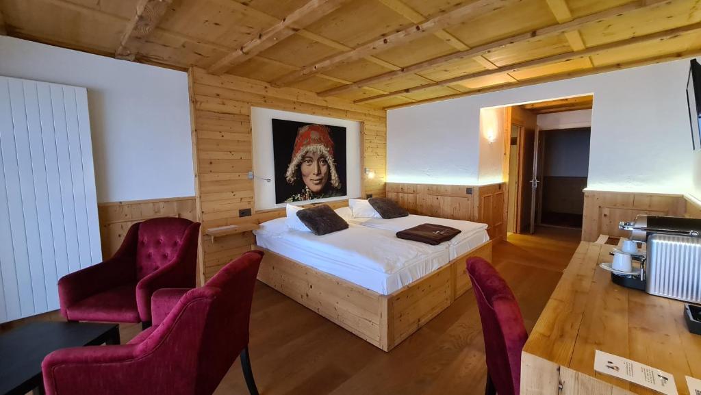 Postel nebo postele na pokoji v ubytování Hotel Etrier