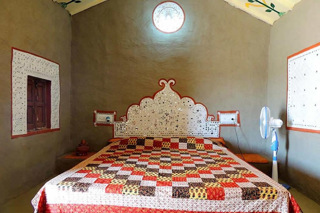 Postel nebo postele na pokoji v ubytování Rann Visamo Resort
