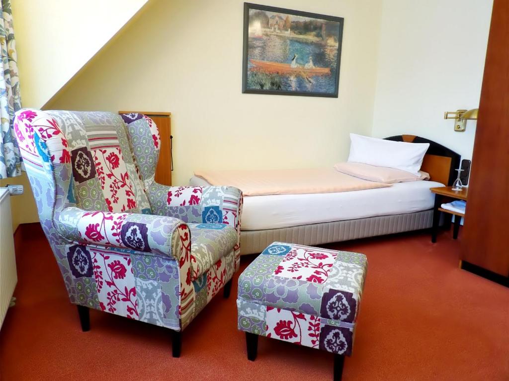 Postel nebo postele na pokoji v ubytování Hotel Jugendstil