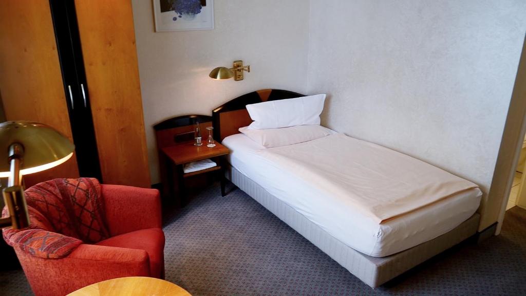 Postel nebo postele na pokoji v ubytování Hotel Jugendstil