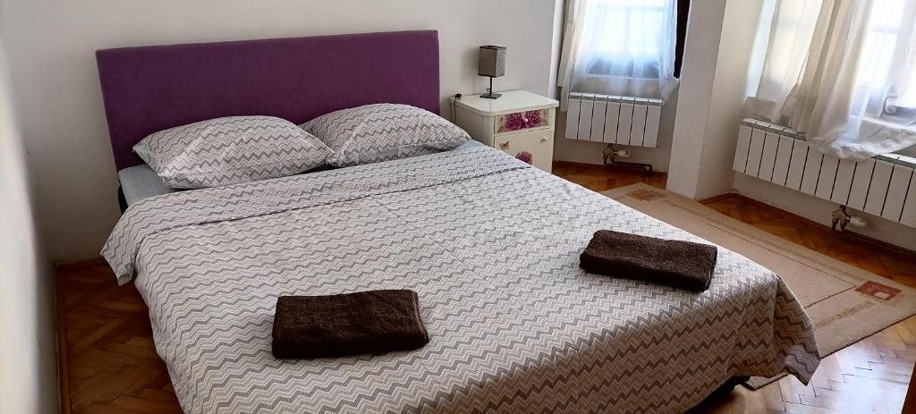 Apartment Splitska tesisinde bir odada yatak veya yataklar