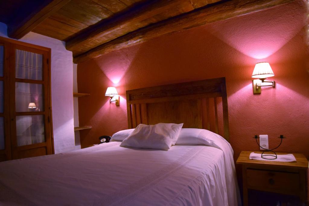 Posteľ alebo postele v izbe v ubytovaní Puerto Roque Turismo Rural