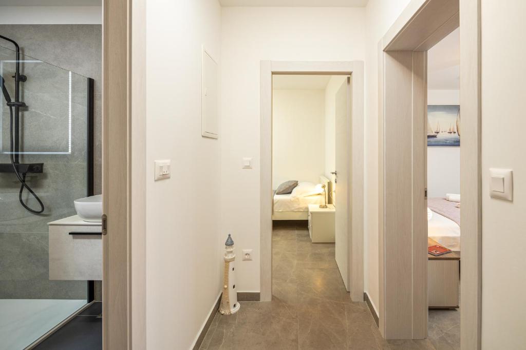 Kúpeľňa v ubytovaní Apartment Navika