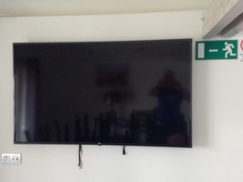 TV a/nebo společenská místnost v ubytování DHofstede vakantiewoning