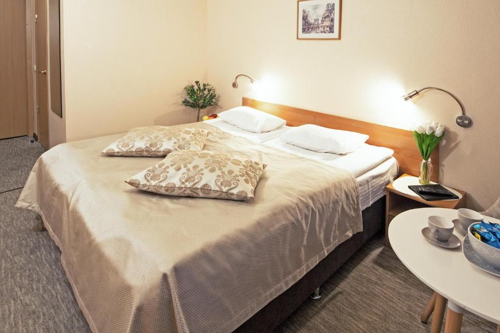 Postel nebo postele na pokoji v ubytování Mini-Hotel Kyivskyі
