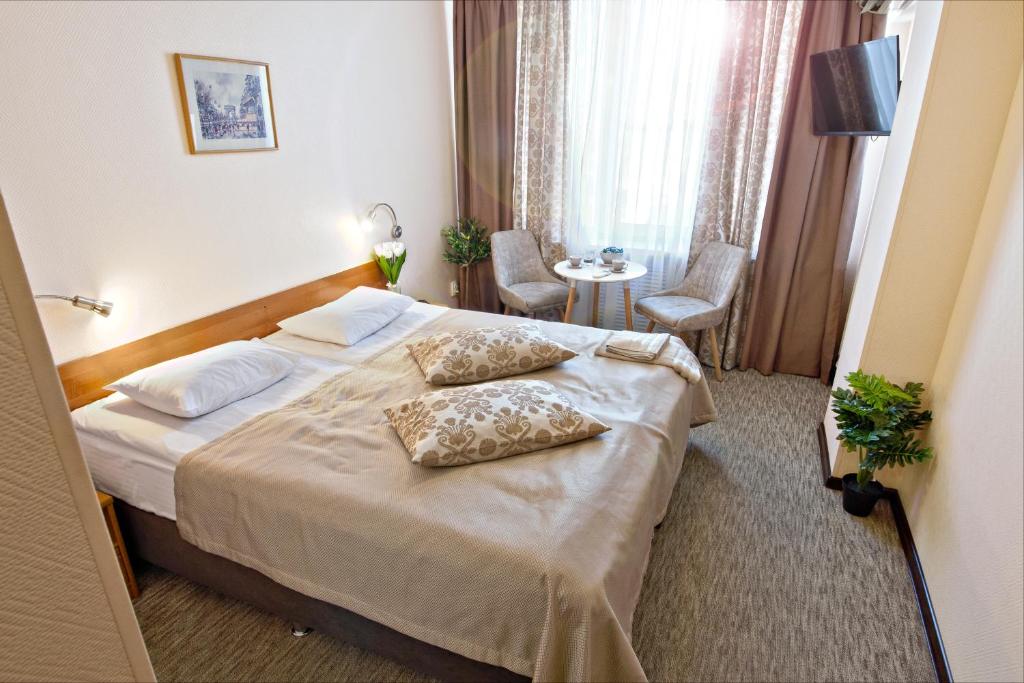 Postel nebo postele na pokoji v ubytování Mini-Hotel Kyivskyі
