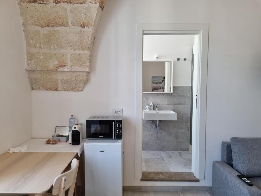 A kitchen or kitchenette at Le radici