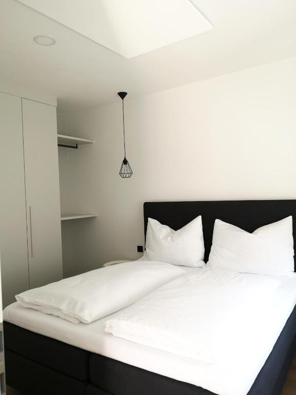 Postel nebo postele na pokoji v ubytování Haus Weiss bei Julia