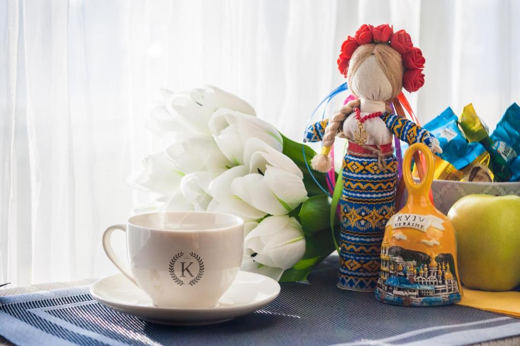 Příslušenství pro přípravu čaje a kávy v ubytování Mini-Hotel Kyivskyі