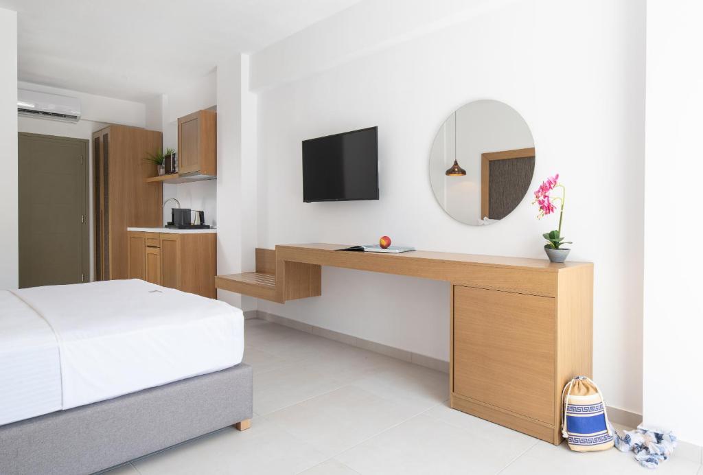 Postel nebo postele na pokoji v ubytování Imagine Luxury Suites