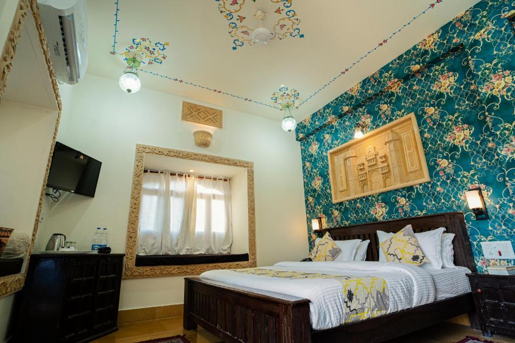Postel nebo postele na pokoji v ubytování Tripli Hotels Prithvi Palace