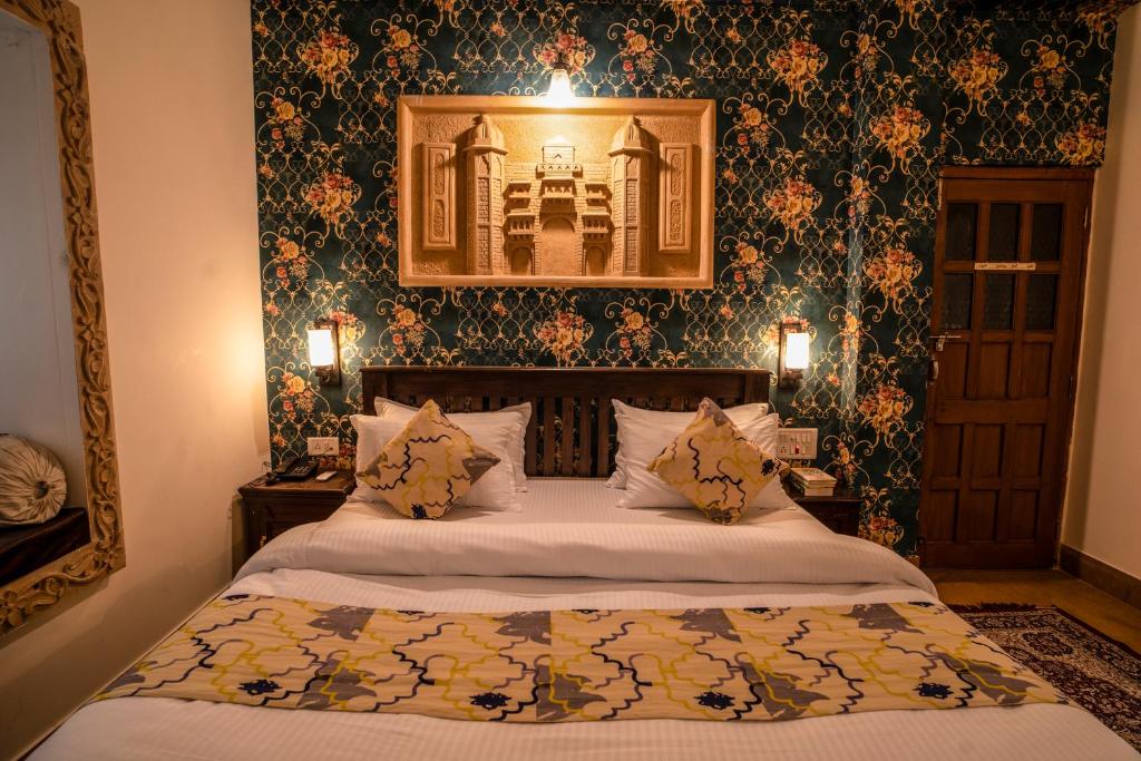 Postel nebo postele na pokoji v ubytování Tripli Hotels Prithvi Palace