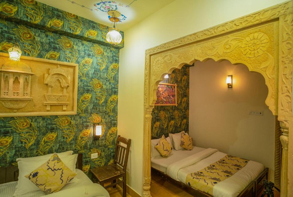 Postel nebo postele na pokoji v ubytování Tripli Hotels Prithvi Palace