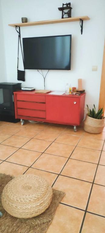 Televízia a/alebo spoločenská miestnosť v ubytovaní La buganvilla de Juana y Antonio