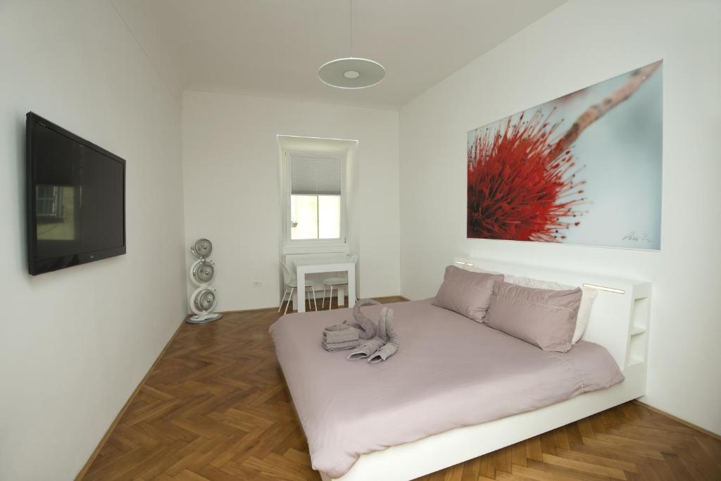 Postel nebo postele na pokoji v ubytování Galeria River