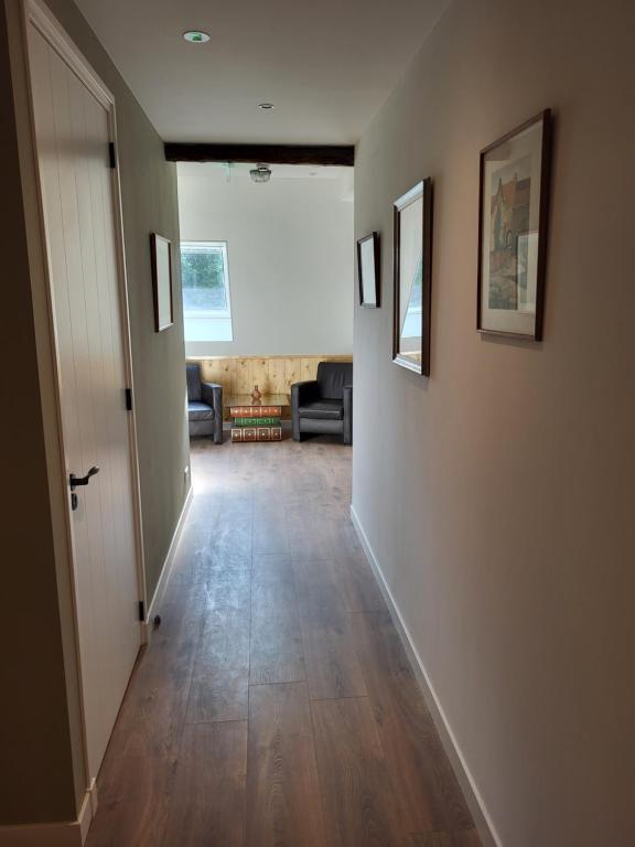 Posezení v ubytování B & B De Tocht