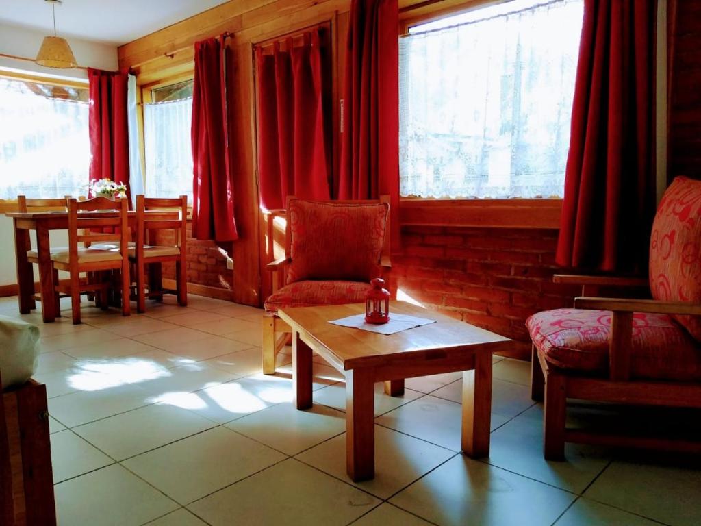 Posezení v ubytování Apart Hotel del Pellin