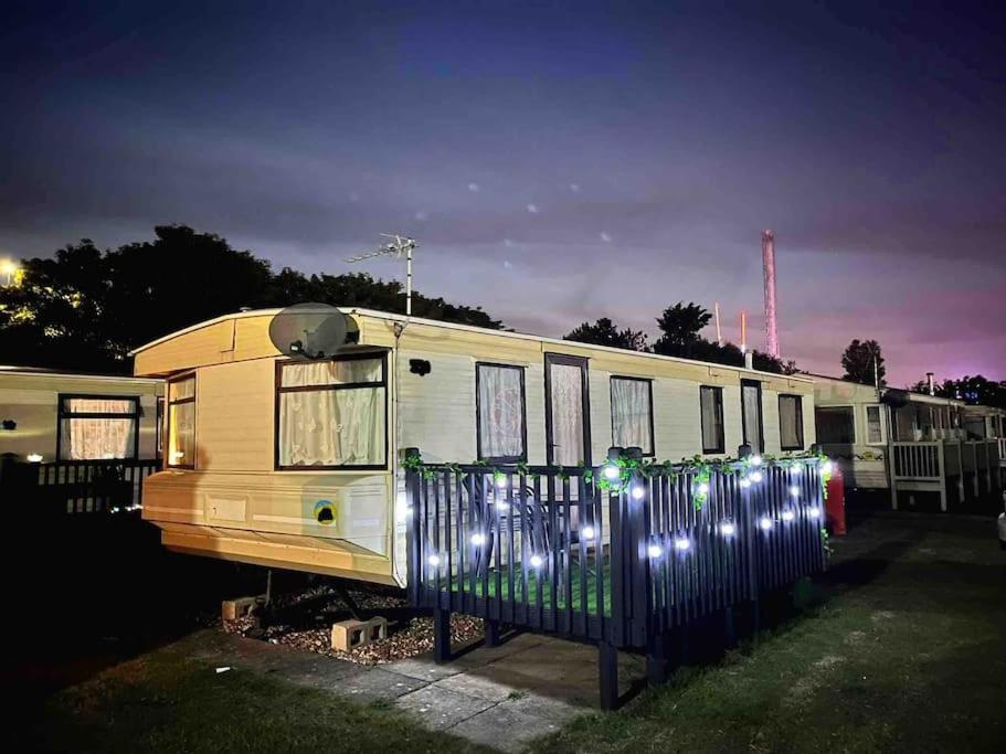 an rv parked with christmas lights on it at Central Ingoldmells, Seaview 6 berth in Ingoldmells