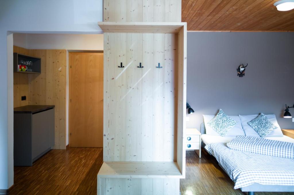 Postel nebo postele na pokoji v ubytování Residence Veider