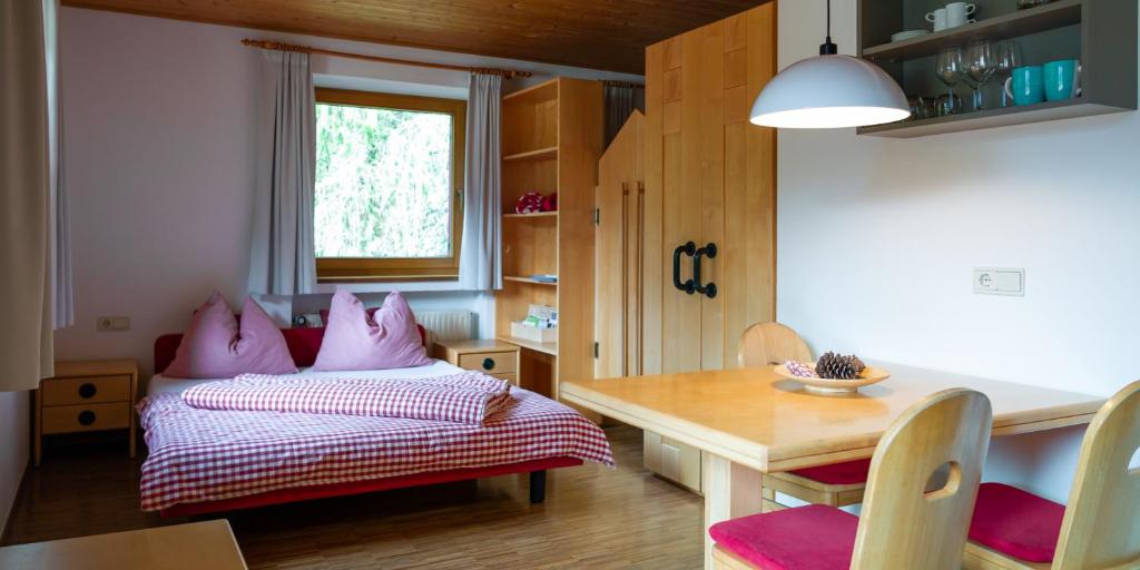 Postel nebo postele na pokoji v ubytování Residence Veider