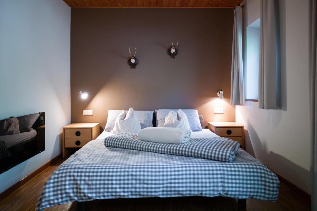 Postel nebo postele na pokoji v ubytování Residence Veider