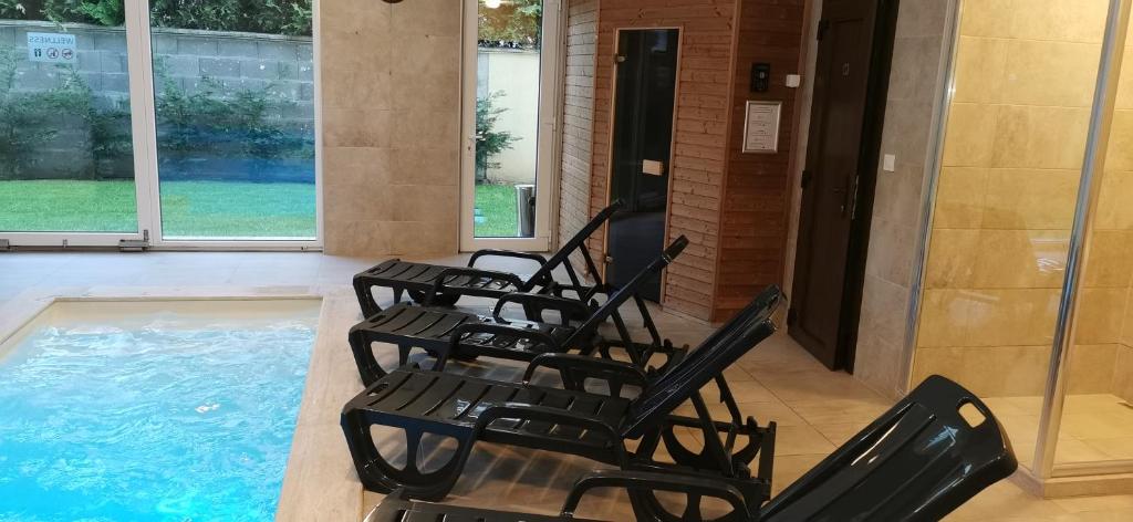 The swimming pool at or close to Sweet&Center Wellness apartman