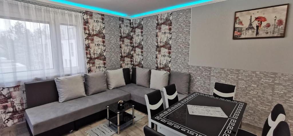 A seating area at Sweet&Center Wellness apartman