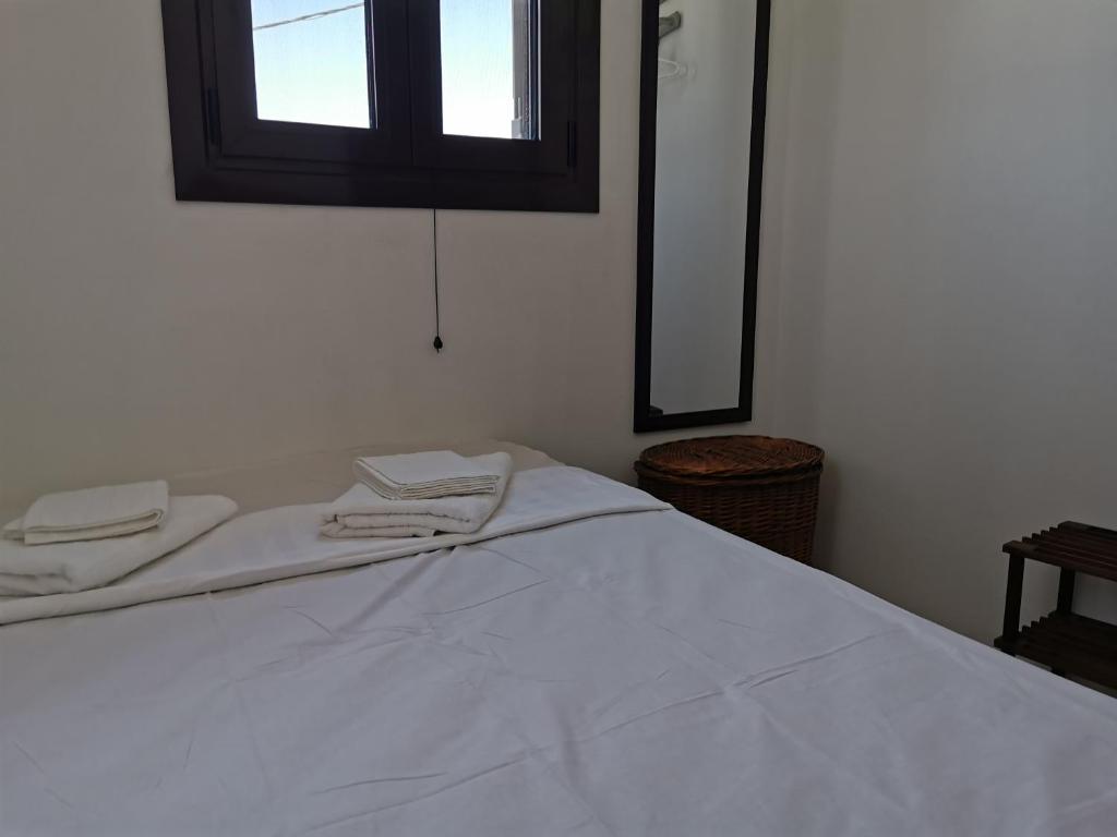 Postel nebo postele na pokoji v ubytování Moscha's View House
