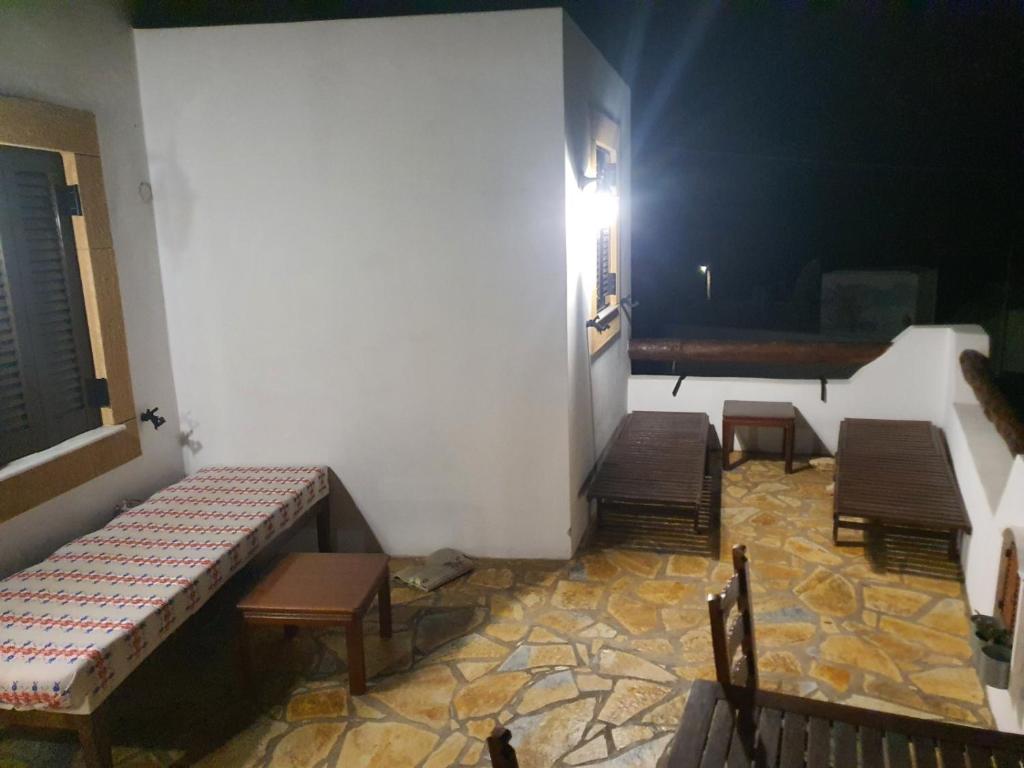 Postel nebo postele na pokoji v ubytování Moscha's View House