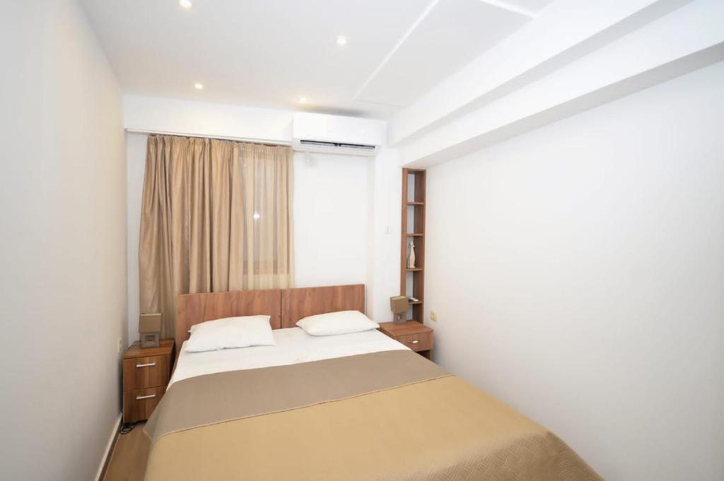 Postel nebo postele na pokoji v ubytování Apartments PROVA