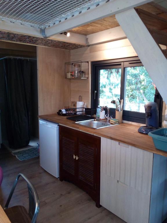 Kuchyň nebo kuchyňský kout v ubytování Tiny House Nouvelle annonce Boho Ocean
