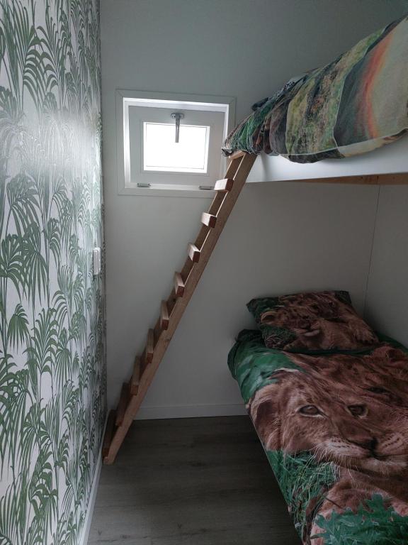 Postel nebo postele na pokoji v ubytování Chalet Moderna Putten