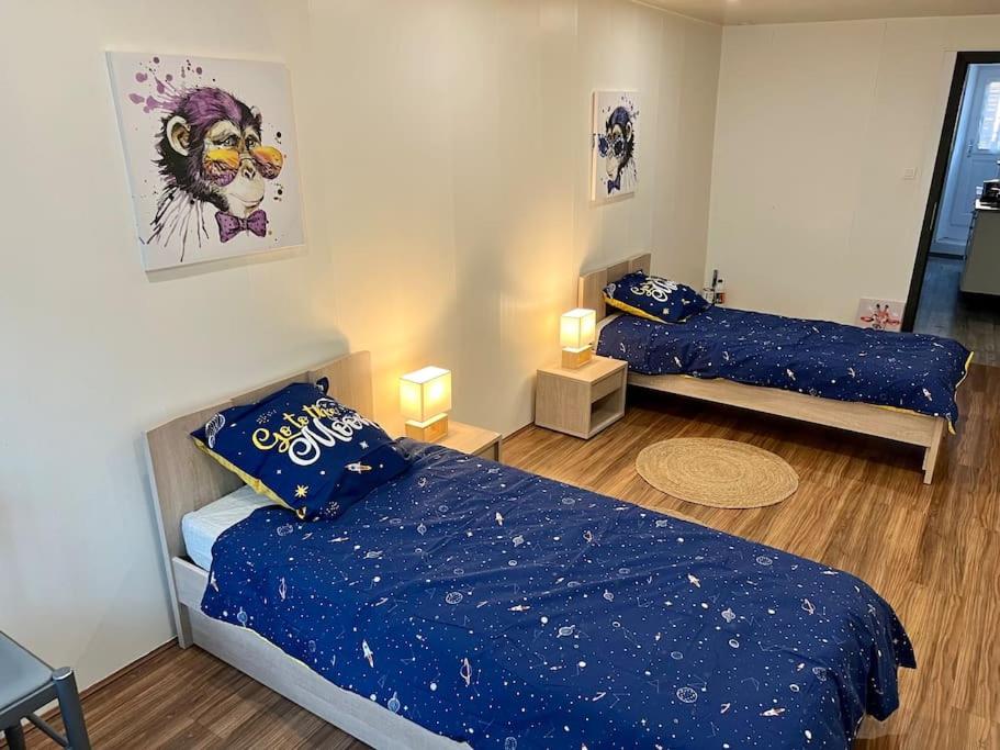 Posteľ alebo postele v izbe v ubytovaní DOLE : L ATELIER DES RÊVES
