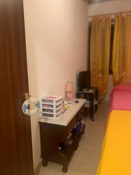 Łóżko lub łóżka w pokoju w obiekcie Casa Dodò al mare di Soverato