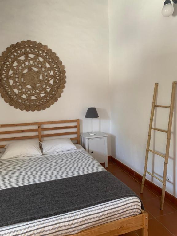 Postel nebo postele na pokoji v ubytování Monte do Pereiro