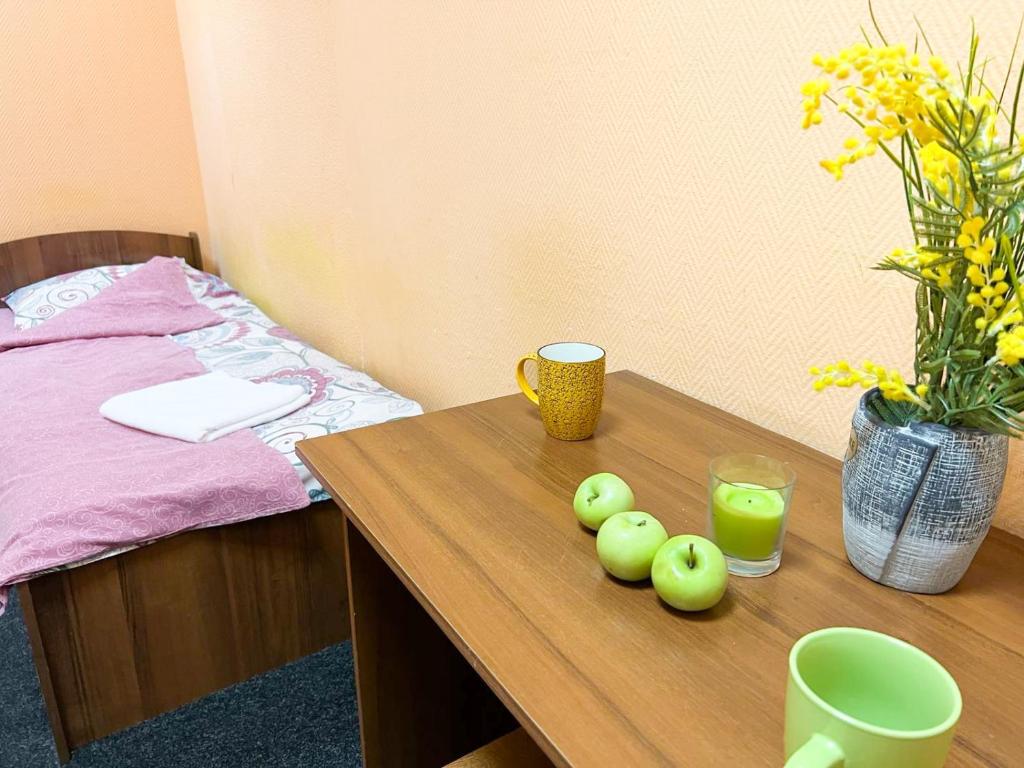 Postel nebo postele na pokoji v ubytování Mini Hotel near Arena City
