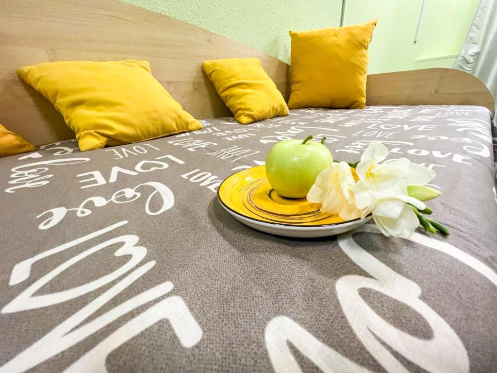 Postel nebo postele na pokoji v ubytování Mini Hotel near Arena City
