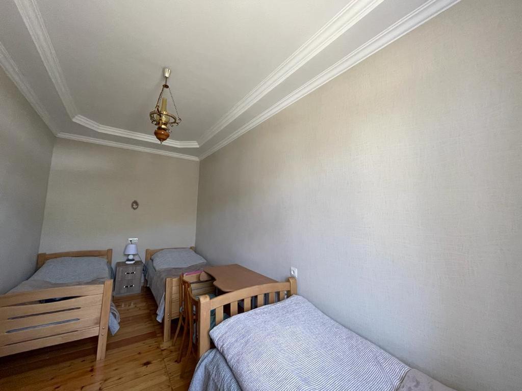 Postel nebo postele na pokoji v ubytování Family Hotel 7 Sisters