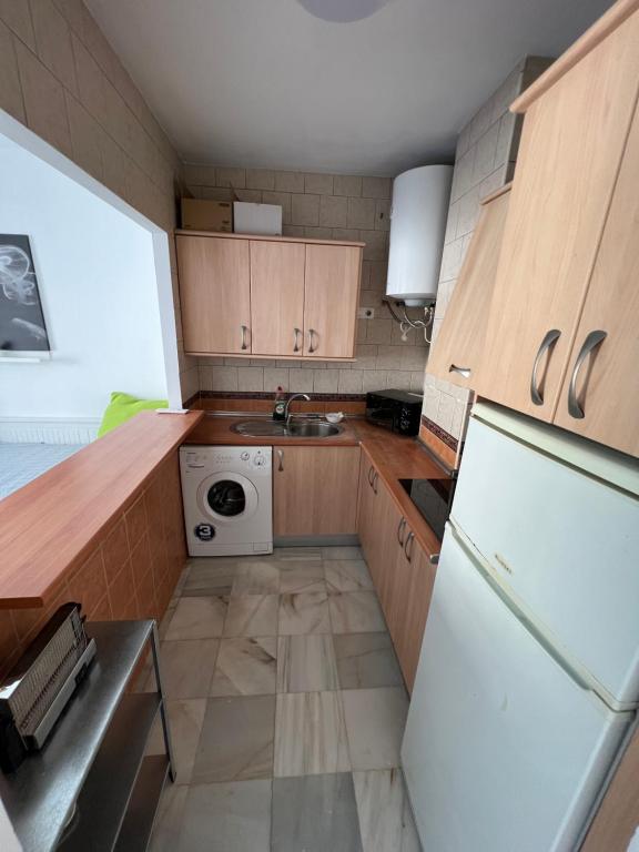 Kuchyňa alebo kuchynka v ubytovaní Genuar Apartments Málaga Center 3