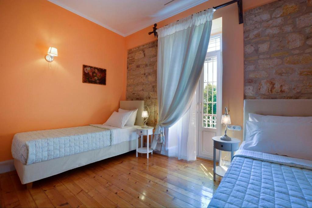 Postel nebo postele na pokoji v ubytování History House
