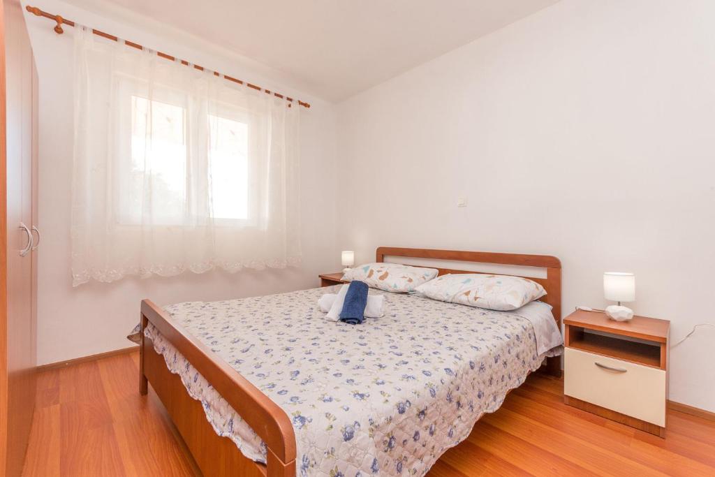 Postel nebo postele na pokoji v ubytování House Quercus
