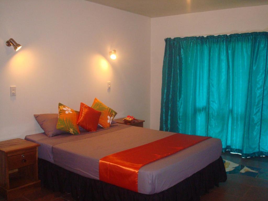 Postel nebo postele na pokoji v ubytování Gecko Lodge Fiji