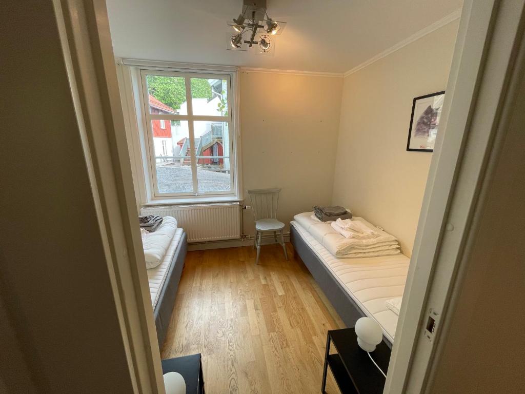 Postel nebo postele na pokoji v ubytování Fint, gratis parkering, med 20 min till Göteborg C