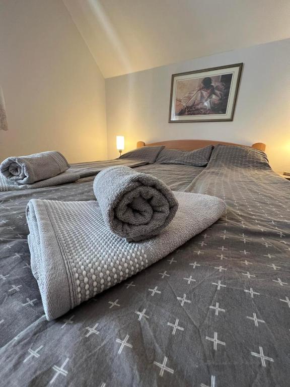Letto o letti in una camera di Valentina Vikendica Divcibare