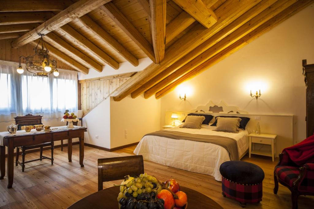 Postel nebo postele na pokoji v ubytování Agriturismo Le Volpi