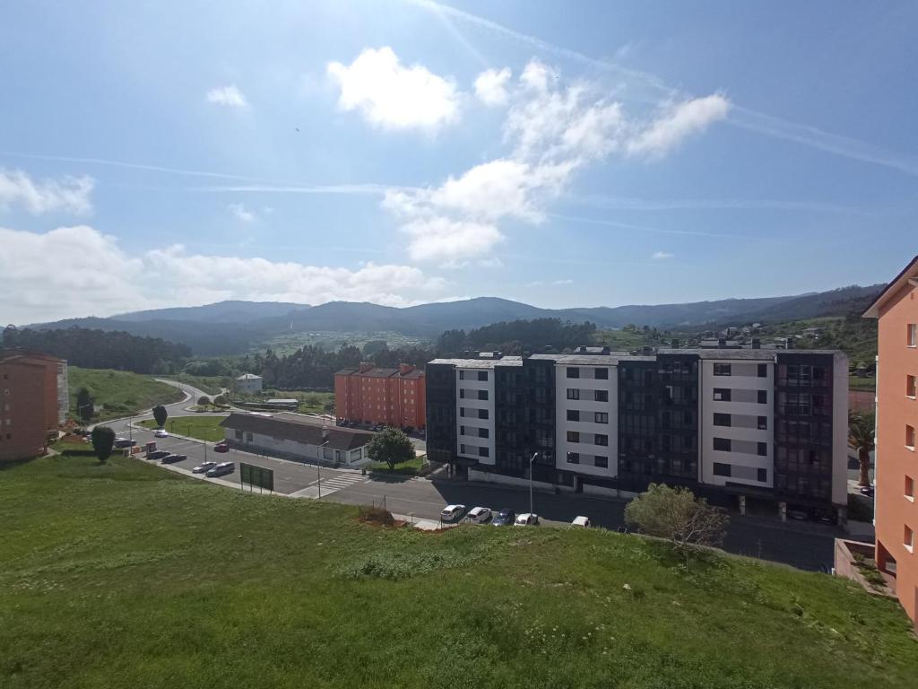 a view of a city with buildings and a street at Palmeiro in Jove