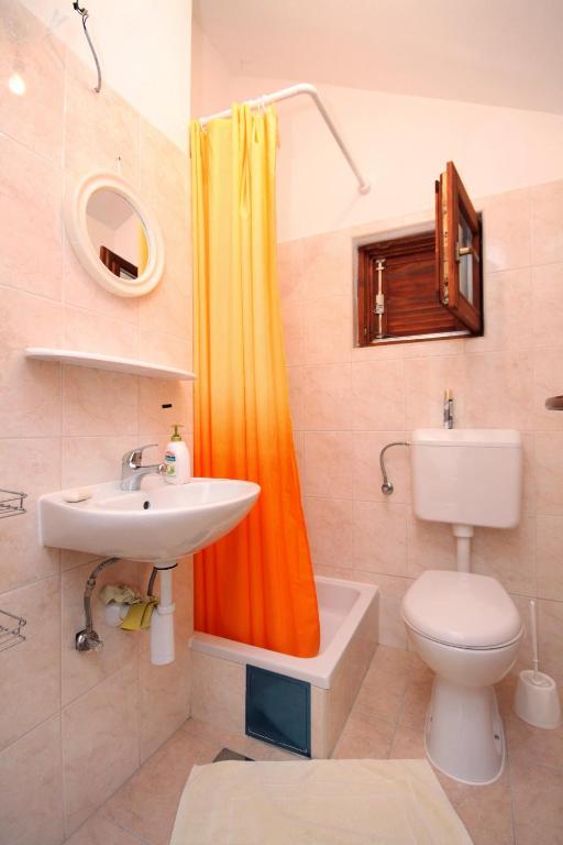 Kúpeľňa v ubytovaní Apartments by the sea Zdrelac, Pasman - 697