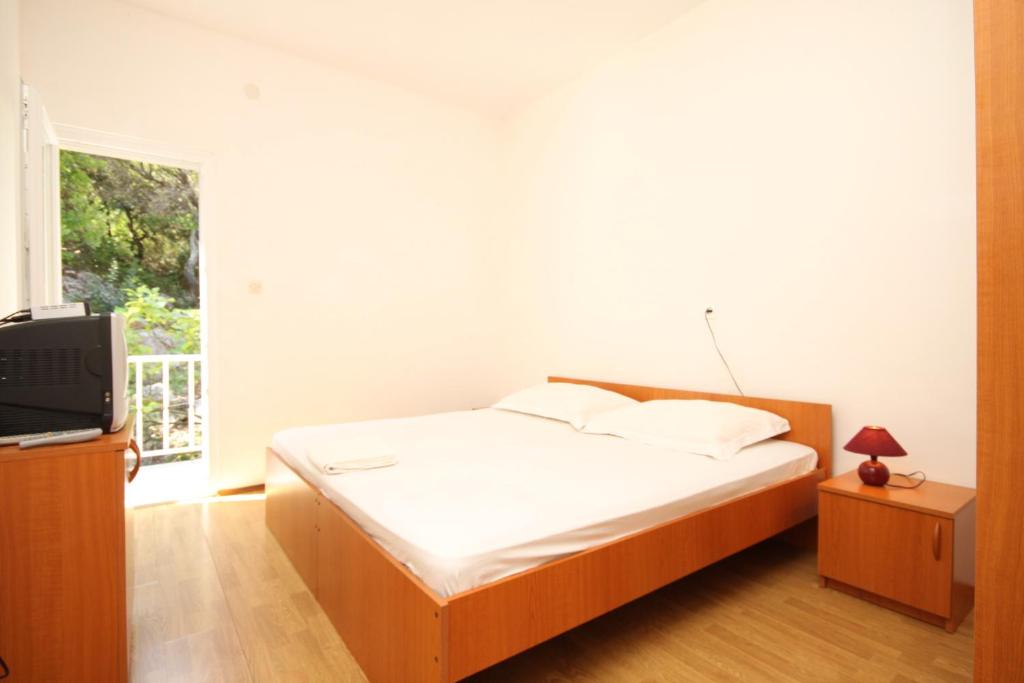 Televízia a/alebo spoločenská miestnosť v ubytovaní Apartment Lucica 990b
